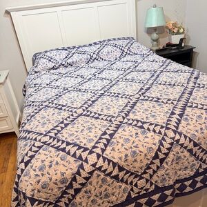 Vintage blue and white diamond patchwork quilt